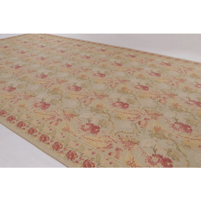 Handwoven in wool, this 13x26 oversized rug dated circa 1980s is a graceful piece from Rug & Kilim’s European rug...