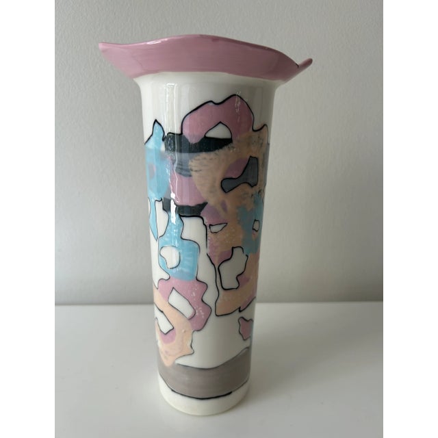 Postmodern contemporary vase with teal, purple and black organic patterns signed Gilson.