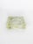 Square molded glass ashtray, France, circa 1940, in the Art Deco style. Made of thick, slightly green-tinted glass, it...