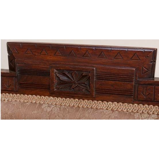 Authentic late 19th-century Victorian Eastlake side chair, circa 1880–1895, featuring a beautifully carved walnut frame...