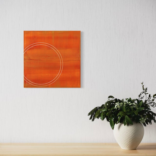 A single traced circle sits low within a warm field of burnt orange, its surface built from layered horizontal strokes...