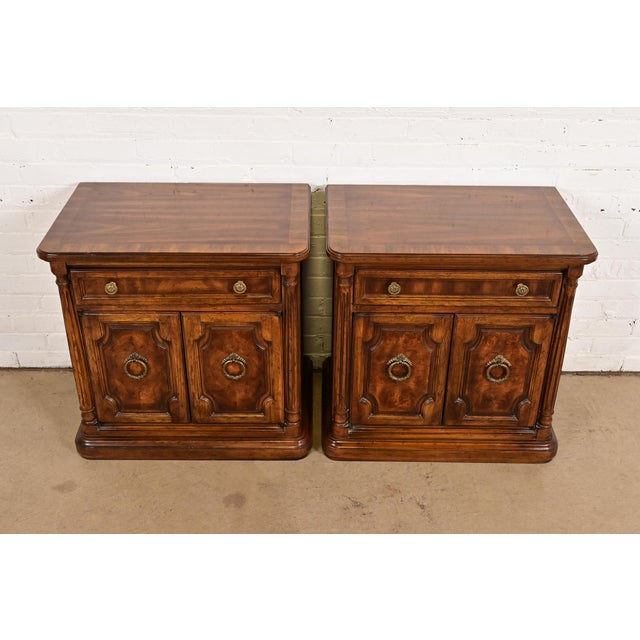 A gorgeous pair of French Regency Louis XVI style nightstands or end tables By Drexel Heritage USA, Circa 1970s Carved...