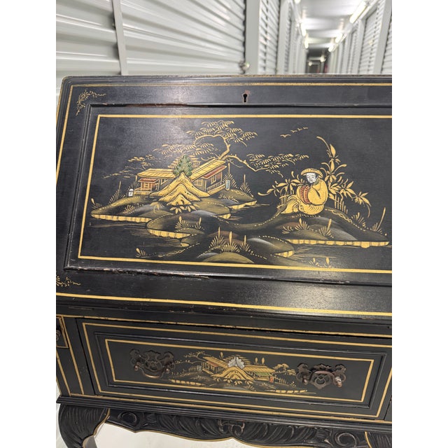 This imported chinoiserie petite drop front desk has a leather writing surface & a storage drawer. It has its original key...