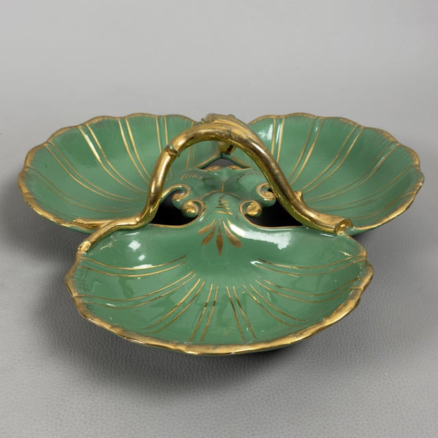 A magnificent italian artistic majolica centerpiece, a visually striking piece dating back to the mid-20th century. This...