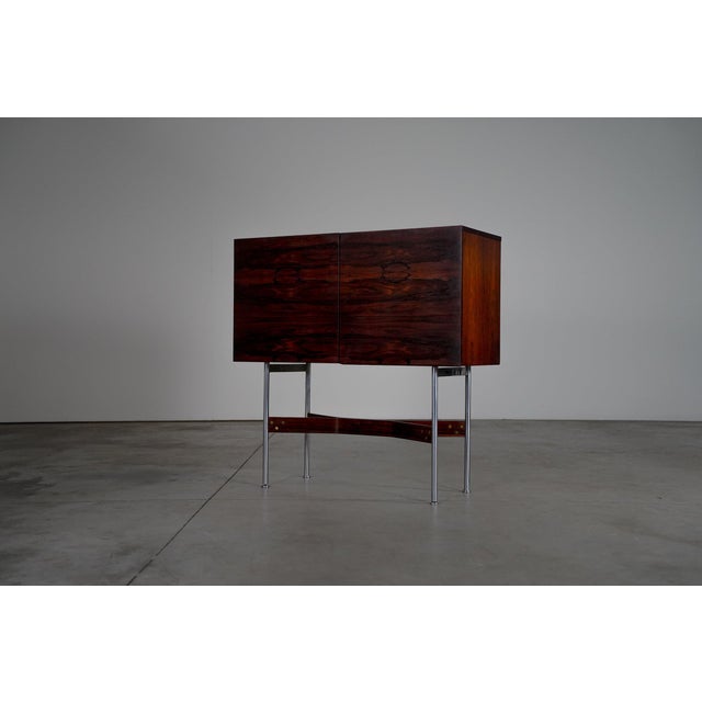 Rosewood cabinet The cabinet in good condition with some traces of usage normal to it’s age.