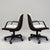 Pair of vintage Steelcase executive office chairs, Pollock style. These chairs have the a cream vinyl faux leather, tufted...