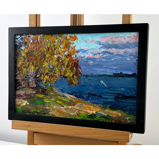 Oil painting River Bank Serdyuk Boris Petrovich is an expressive landscape that captures the vivid beauty of an autumn...