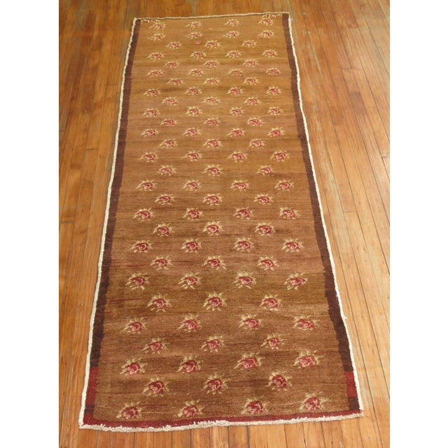 Mid-20th century Turkish runner with an all over repetitive flower design. 2'11'' x 7'8''
