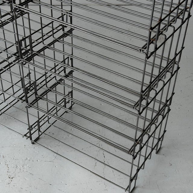 c. 1990s. Sold as a set. Shelving system made of metal rods. All adjustable