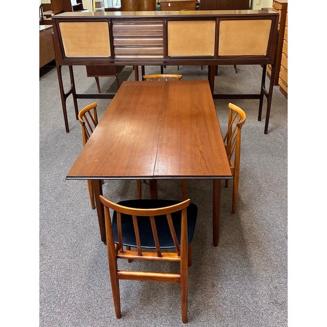 Iconic European Mid Century Modern Teak & Wicker Nesting Dining Suite W/ Credenza, Dining Table & Four Chairs c.1960 For Sale - Image 16 of 18