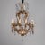 Circa 1920's French bronze and crystal chandelier with eight 4" candle base sockets and four small brass candle base...