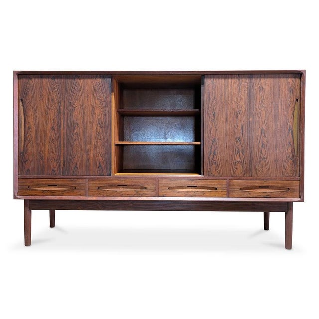 Vintage Danish made in the 1950's and recently refurbished in our Red Hook workshop Dimensions: 43.5" H 71" L and 17.5" D...