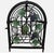 This vintage black metal wine rack features an elegant ivy and grape motif with intricate scrollwork and a charming domed...