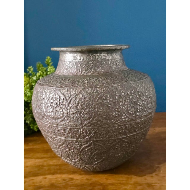 Beautiful antique repoussé silver-plated copper vase, likely of Indian origin, dating to the early 20th century. The...
