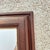 Antique walnut framed mirror
