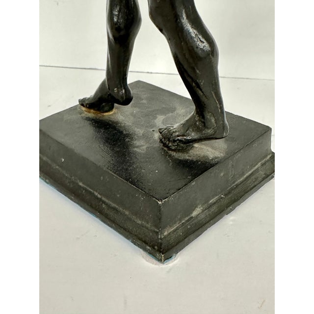 A lovely and well cast example of the Pompeian Dancing Faun. This grand tour bronze stands approx 11.75 inches tall about...