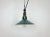 Industrial petrol enamel pendant light made in Poland during the 1960s. White enamel inside the shade. Green cast...