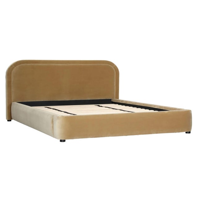 Contemporary luxe camel toned velvet upholstered bed frame in eastern king size. Soft polyester velvet fabric with birch...