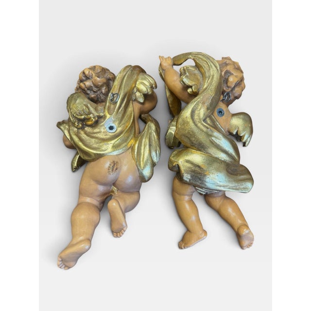 Stunning Pair of Vintage Osvaldo Moroder Val Gardena Hand-Carved Wood Cherubs (11"). A breathtaking, authentic matching...
