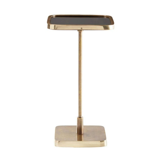 Polished brass on the base and lip contrast beautifully with the vintage brass pedestal and black mirror top. Group with...