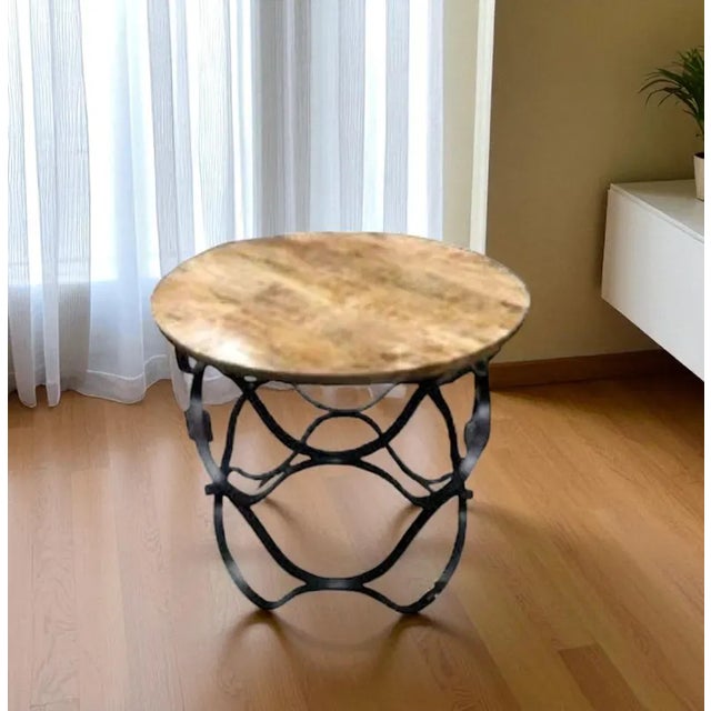 Add rustic-industrial charm to your space with this pair of round side tables, featuring solid mango wood tops and sturdy...