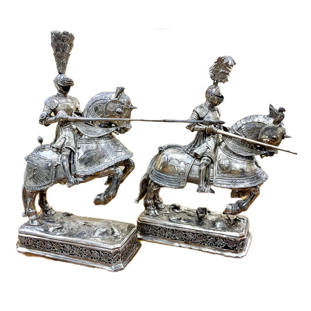 Dramatic Pair of Silver Jousting Knights on Horseback Sculptures. Sculptures depict armored jousting knights mounted on...