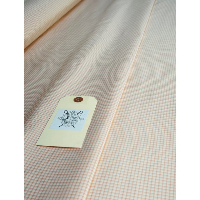 A delicate mini check in coral & ivory woven in a flat silk & cotton taffeta quality. Great for light duty residential use...