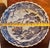 This vintage Japanese Imari ceramic plate showcases the classic blue and white color scheme, featuring a Takarabune...