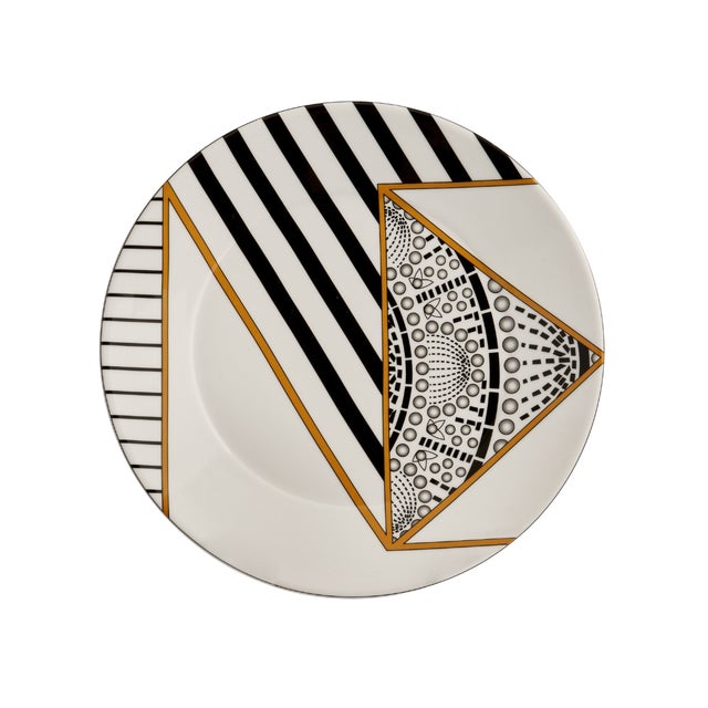 Crafted from fine porcelain, this set of four Alina Bread & Butter Plates is defined by bold graphic lines, intricate...