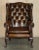 Vintage Pair of Chesterfield Chestnut Brown Leather Wingback Armchairs & Footstools For Sale - Image 4 of 18