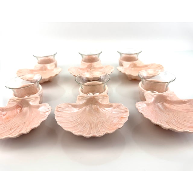 Set of six Karoff Original shell-form snack dishes featuring softly marbled blush resin shells paired with removable clear...