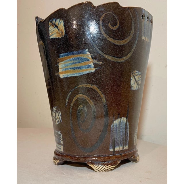 Add a touch of uniqueness to your decor with this beautiful handmade Studio pottery vase. The brown glazed design is...