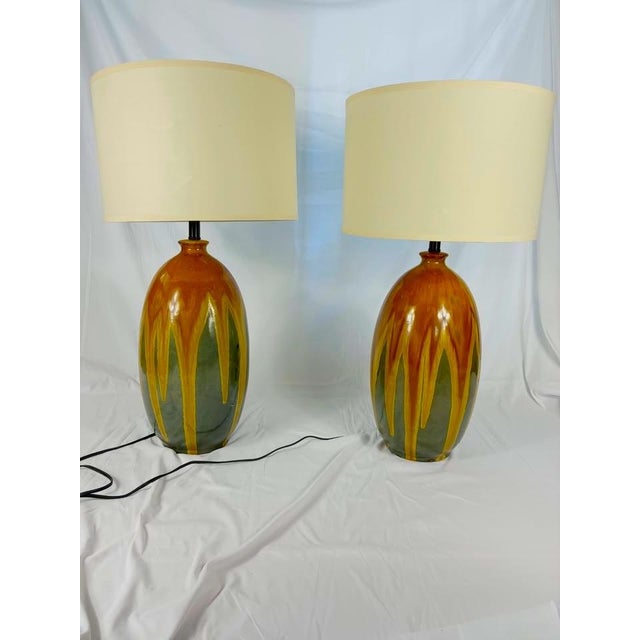 A set of large midcentury drip glaze lamps. With their deep luster and vibrancy, they are an incredible addition to...