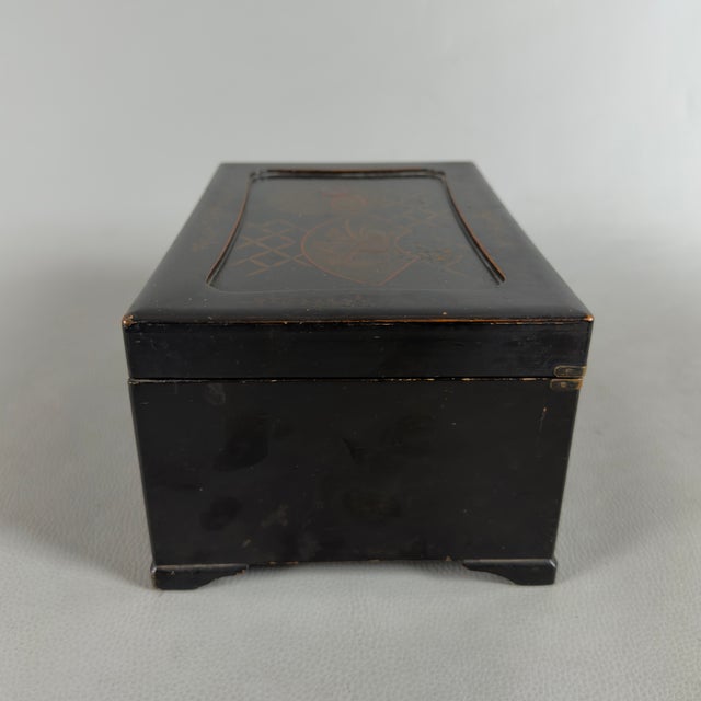 An intimate and rare antique treasure chest, perfect for storing jewelry, letters, or small mementos, capable of lending a...