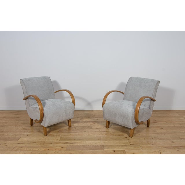 Set of 2 art deco armchairs model 410 by jindřich halabala for up závody produced in the 1930s. It is made of ebonized...