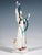 Excellent meissen porcelain figurine: female acrobat with long dark hair and tall headdress, wearing a skimpy bustier...