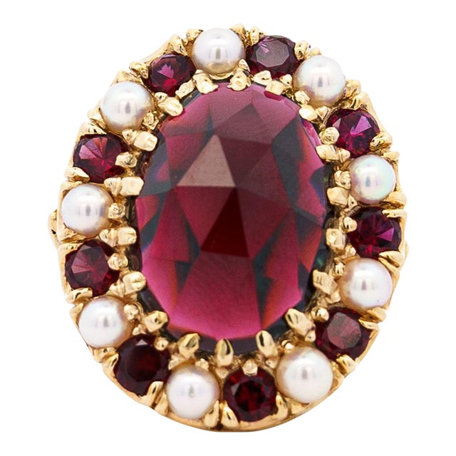 Vintage 10 Carat Oval Cut Garnet and Pearl Halo 14k Yellow Gold Cocktail Ring Size 6.25 For Sale