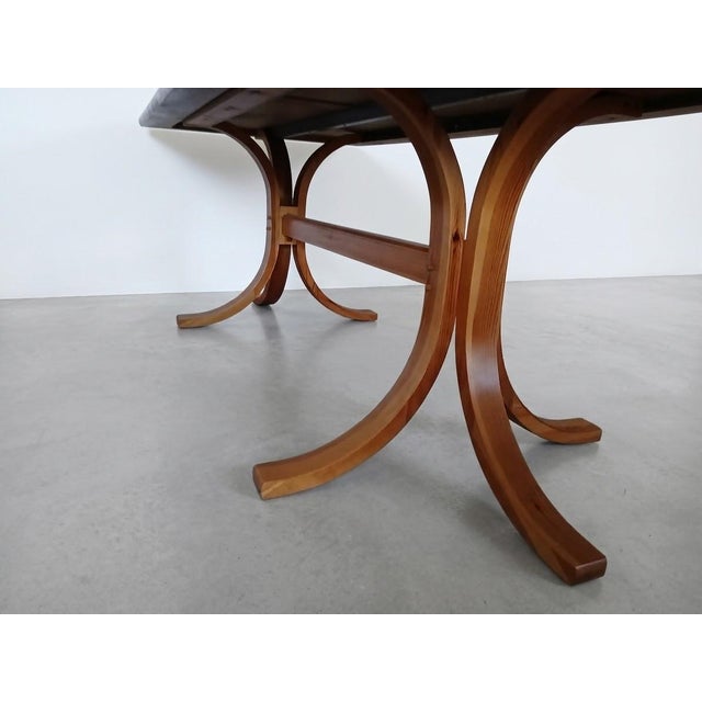 Mid-Century Modern Scandinavian Minimalist Teak Dining Table, 1990s, in Flawless conditions. Designed 1950 to 1959 This...