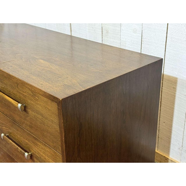 Art Deco Style Chest of Drawers in Walnut and Oak, 1950s, in Good conditions. Designed 1950 to 1959 This piece has an...