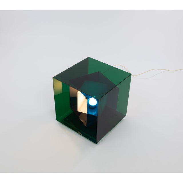 Caleidoscopio table lamp designed by Giorgio Longoni in 1968 and manufactured by Stilnovo. The lamp consists of three...