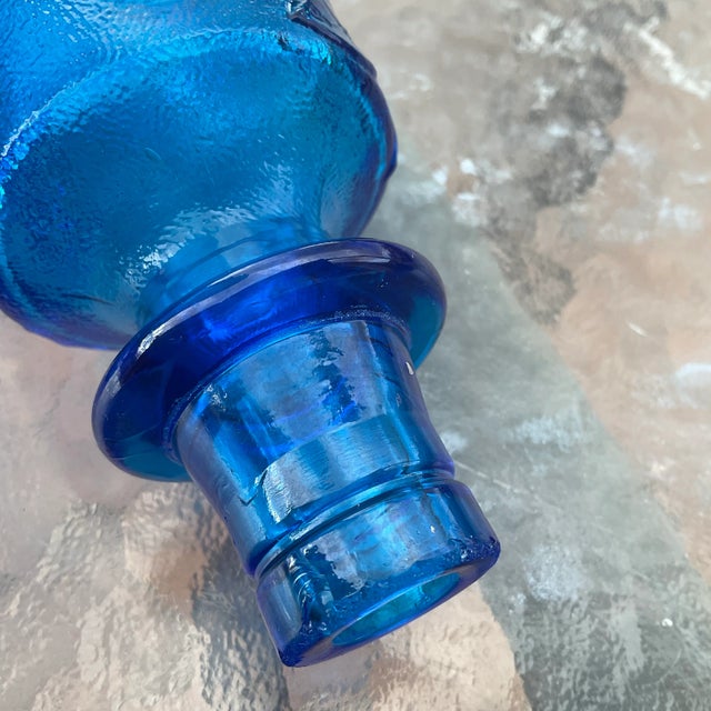 This is a beautiful Empoli decanter that is in very good condition except that the stopper does have a little flake of...