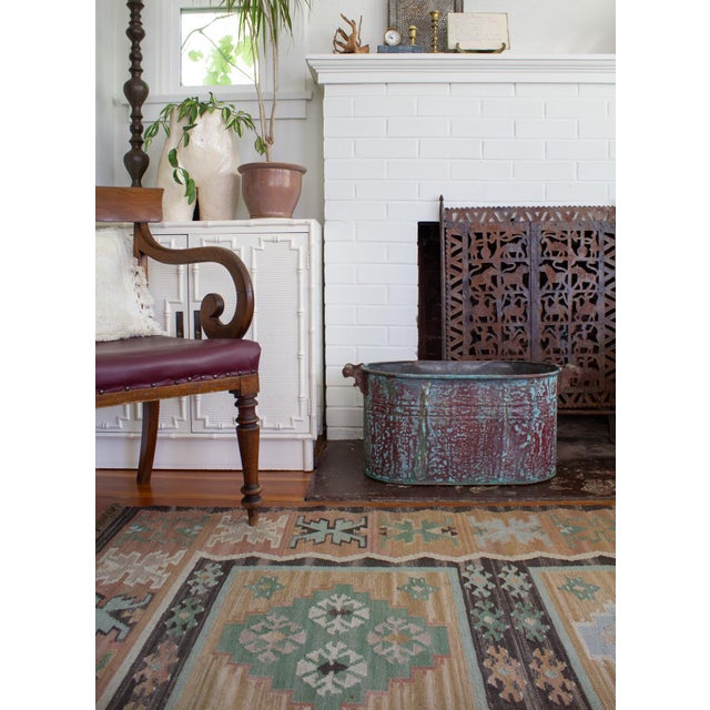 This late 19th-century or early 20th-century antique copper boiler or washtub is generously sized for repurposing as a...
