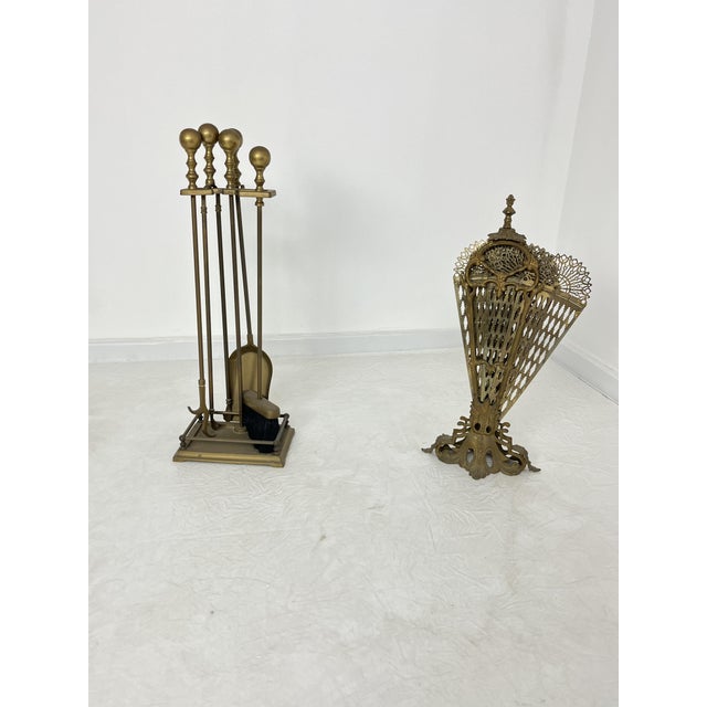 Fireplace spark guard set with peacock tail and tools, brass, 1970s The fan-shaped spark guard can be opened to protect...