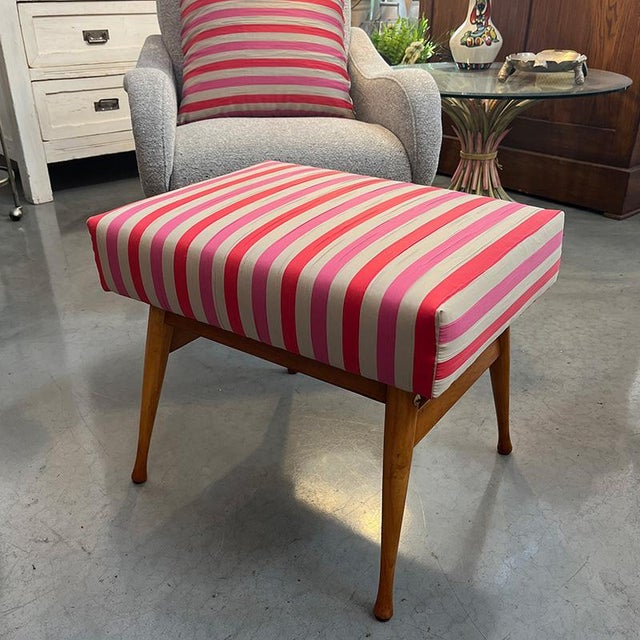 Reguitti footstool from the 1950s with wooden structure and new red and pink striped covering. The striped pattern of...