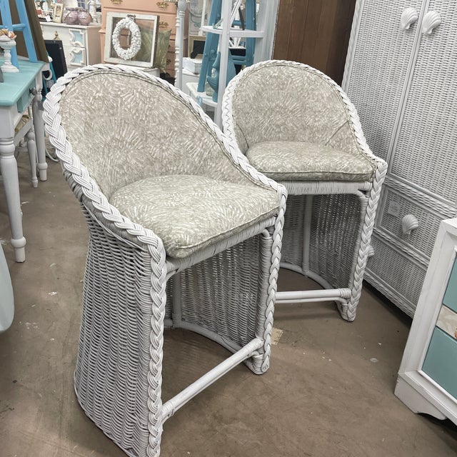 Vintage wicker bar stools with a very retro meets coastal kind of vibe. Heavy gauge wicker with thick braided trim and a...