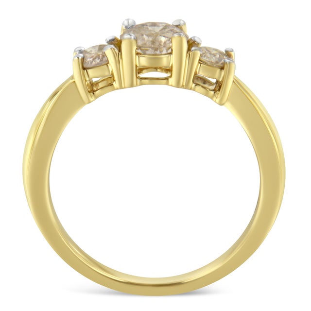 Beautifully crafted of 10-karat yellow gold, this stunning anniversary ring showcases one carat of diamonds in a classic...
