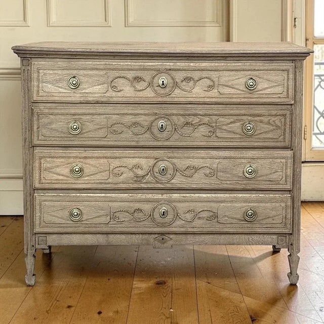 18th Century Liègeois Louis XVI Period Stripped Oak Commode is exceptional in its elegant neoclassical style. Crafted in...