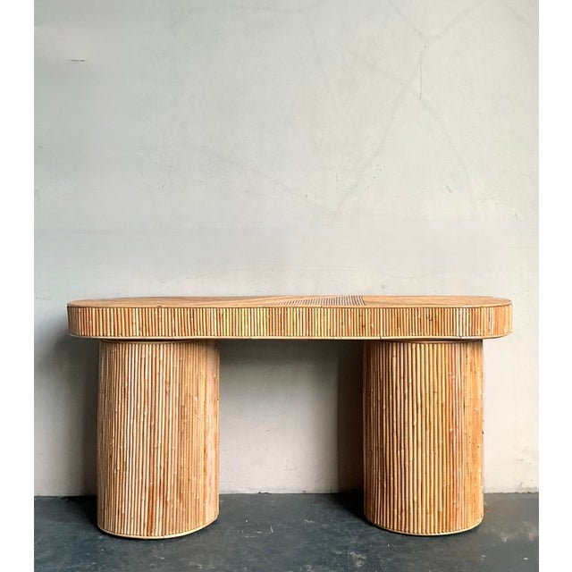 This spectacular console table is a definitive piece of Mid-Century Modern design, celebrating natural materials with...