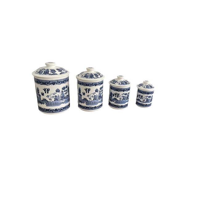 Blue Willow transferware canisters in a rare, full set of 4 with all lids intact. Made in Japan c. 1920s Dimensions: large...