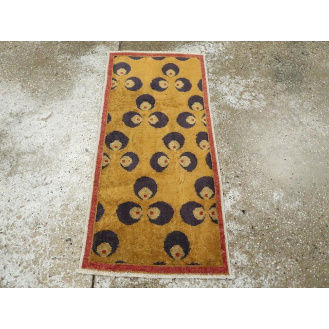 This Mid-20th century Turkish Art Deco throw rug, is a striking example of modernist influences adapted into traditional...